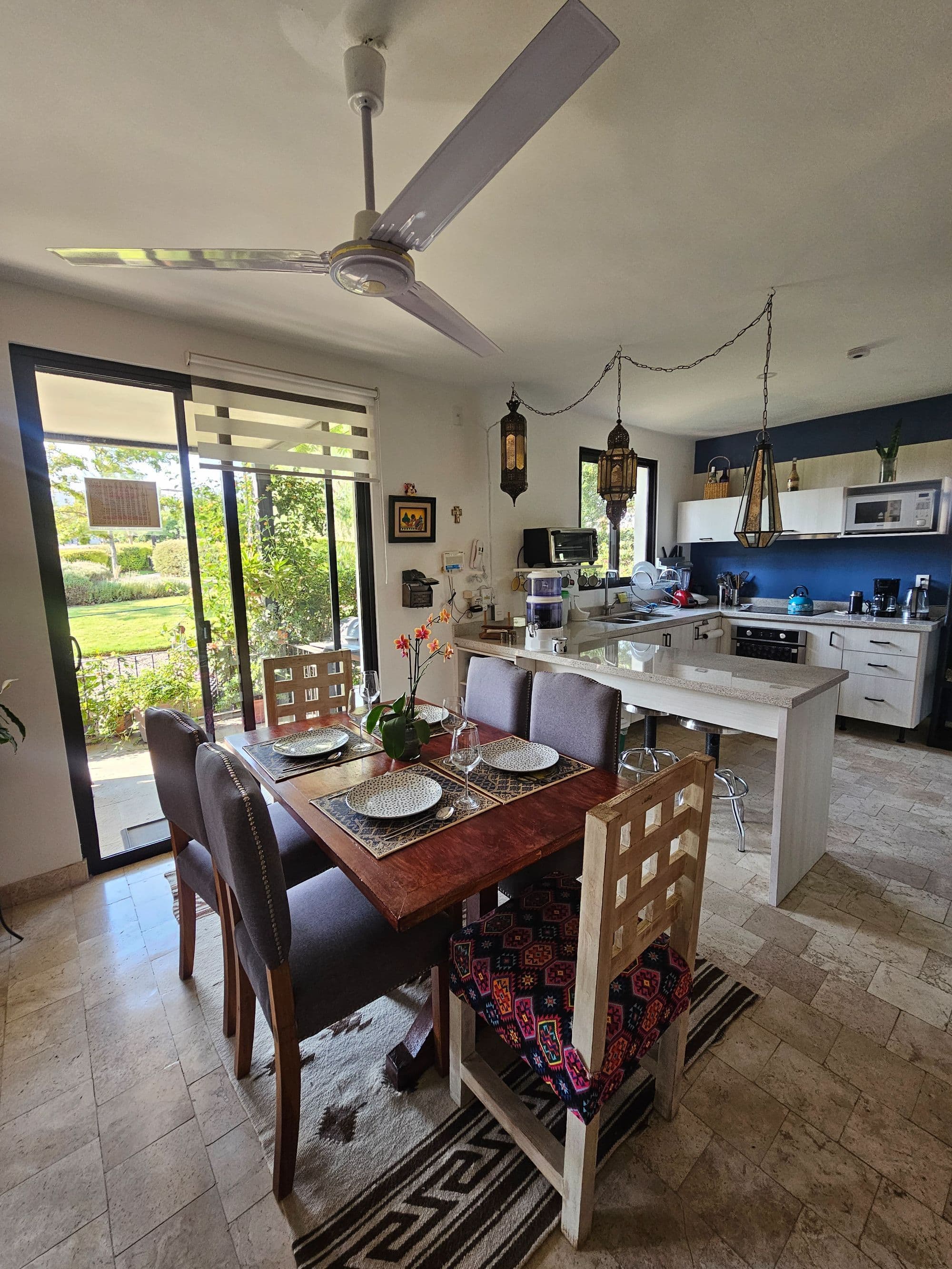 Condo Colores en Luminaria — La Luminaria, San Miguel de Allende — photo 12 — luminous open-concept living with garden views
