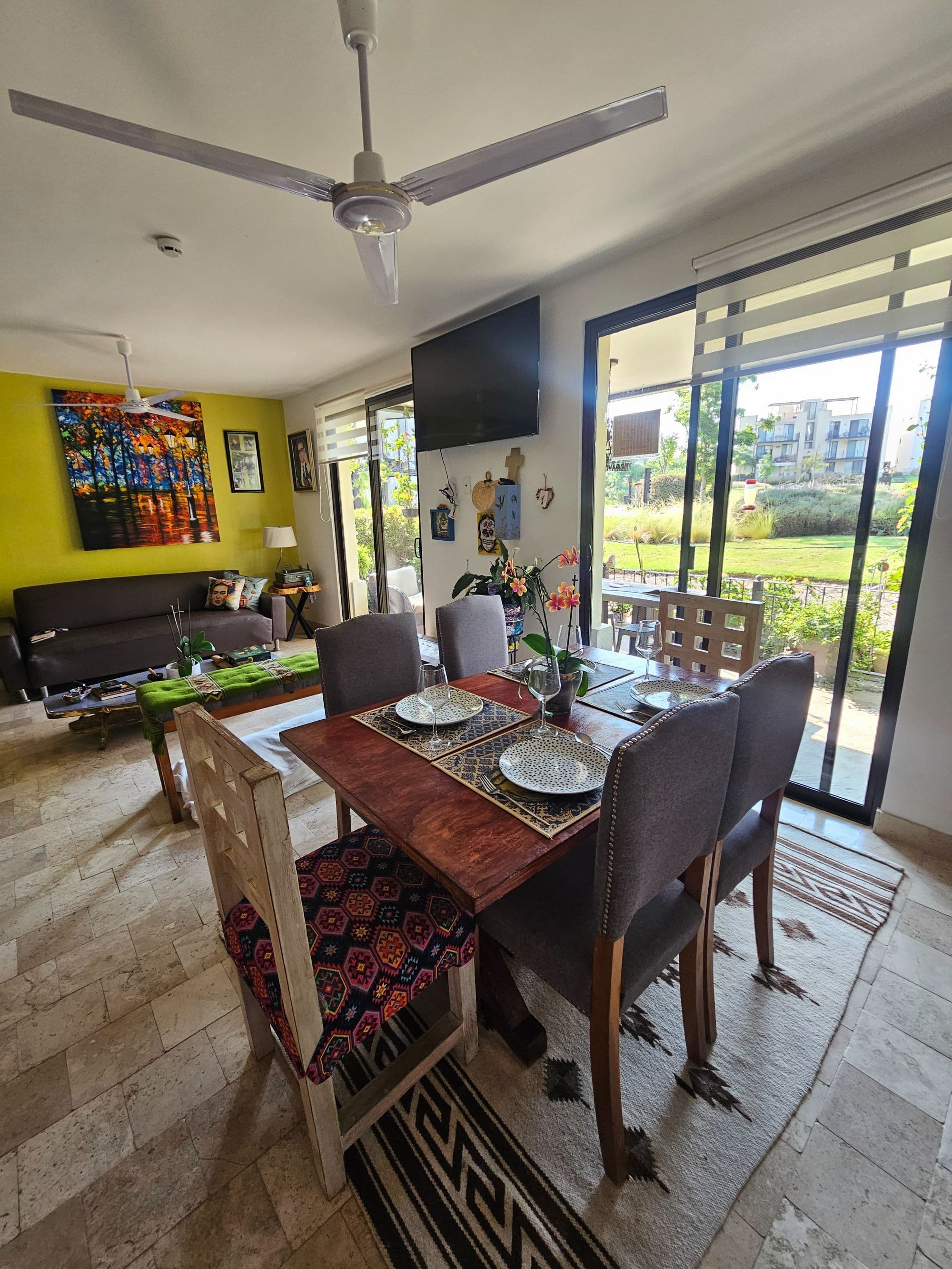 Condo Colores en Luminaria — La Luminaria, San Miguel de Allende — photo 15 — vibrant open-plan living with garden views