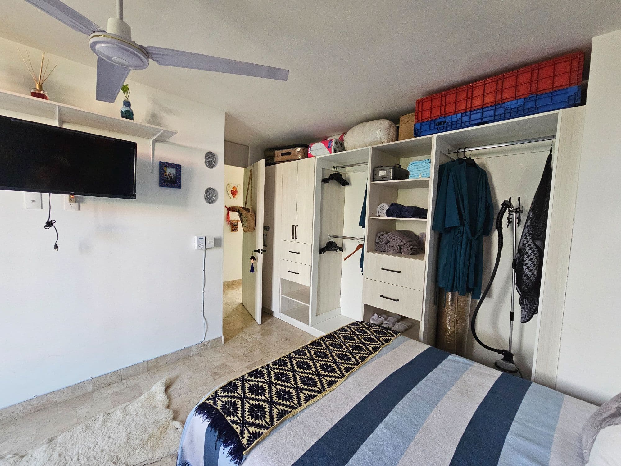 Condo Colores en Luminaria — La Luminaria, San Miguel de Allende — photo 13 — spacious, organized master bedroom sanctuary