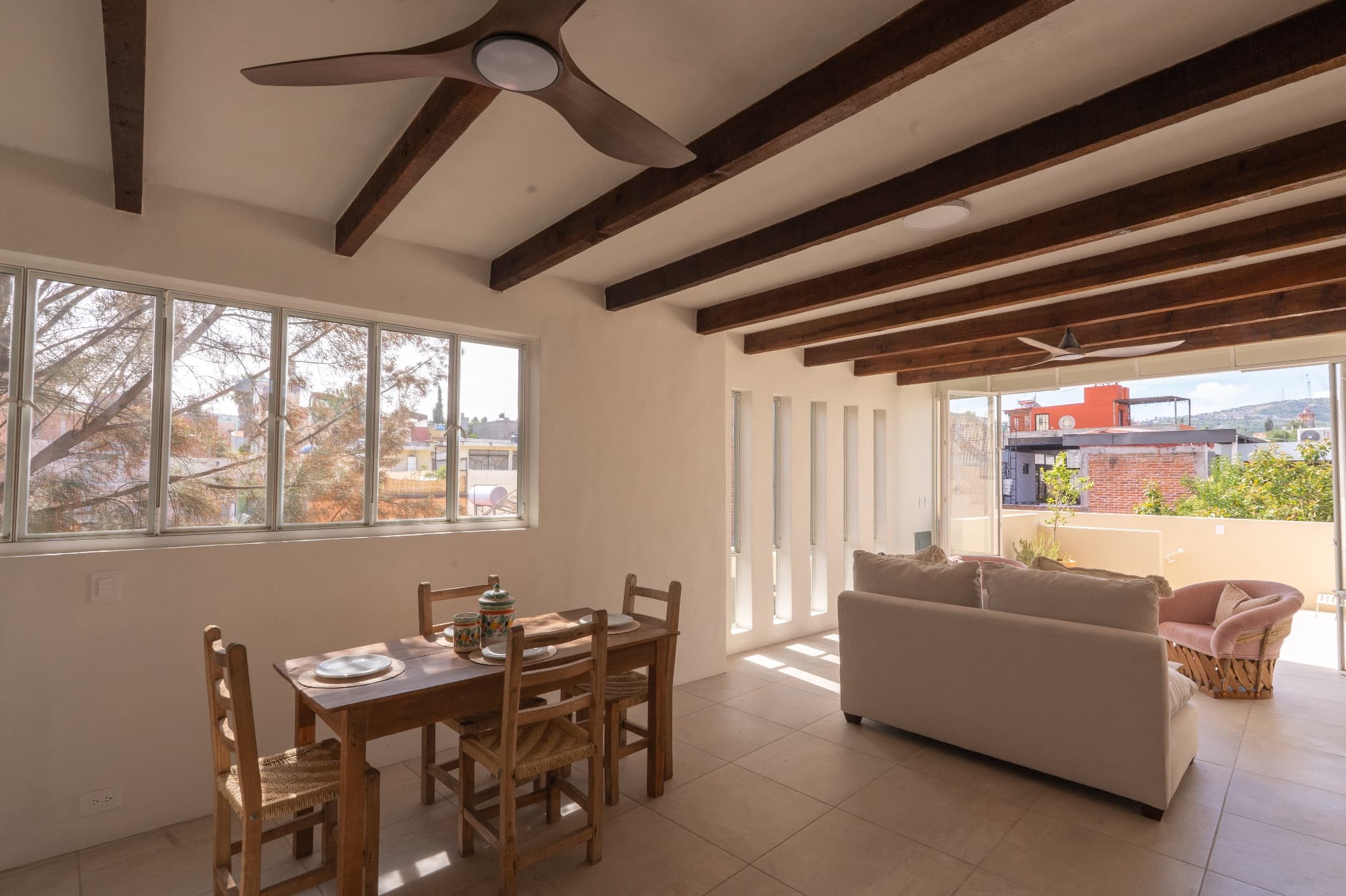 Condo del Sol — Guadalupe, San Miguel de Allende — photo 13 — luminous open-concept living with exposed beams