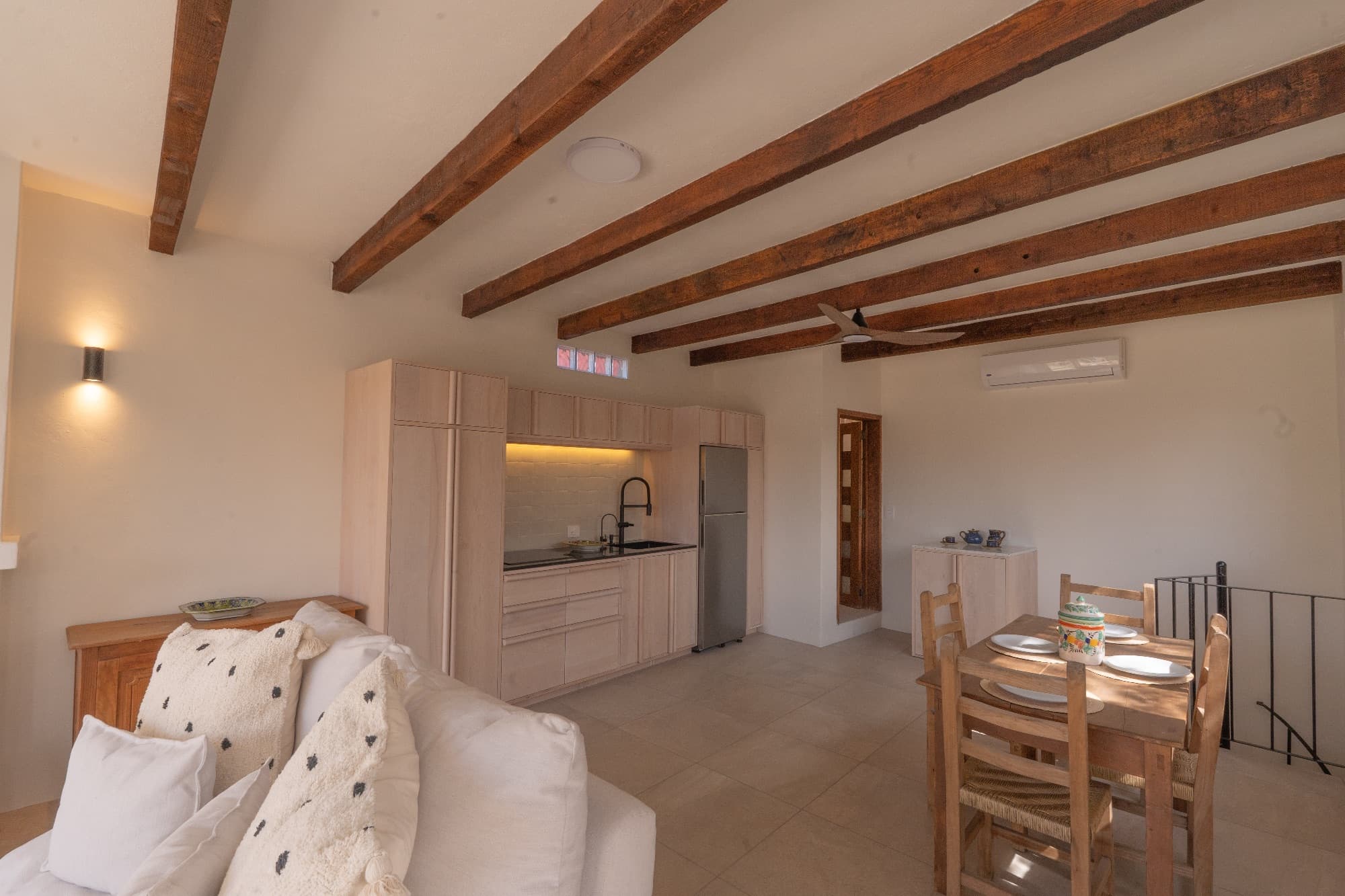 Condo del Sol — Guadalupe, San Miguel de Allende — photo 11 — rustic beams, open living elegance