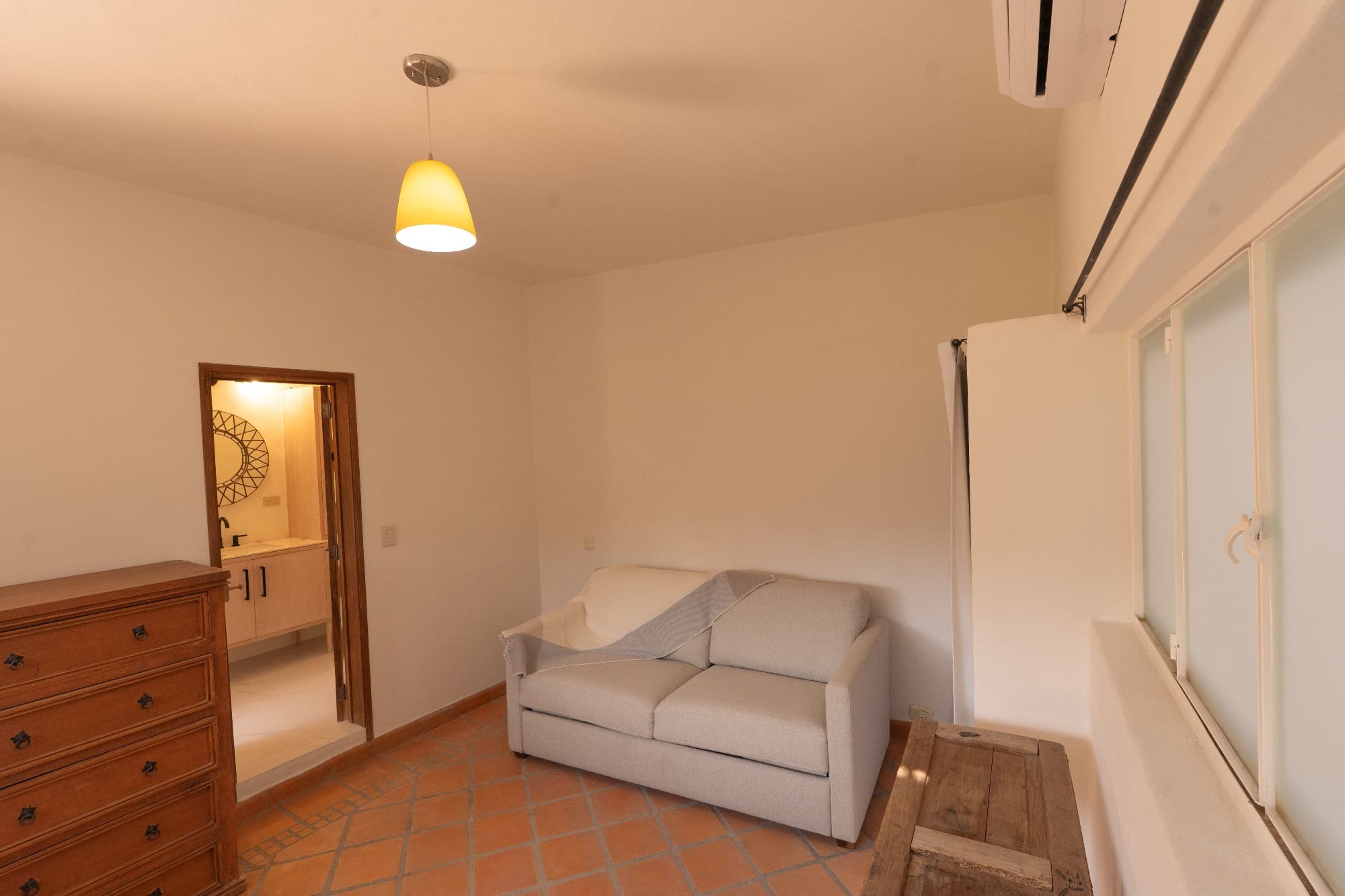 Condo del Sol — Guadalupe, San Miguel de Allende — photo 14 — sophisticated guest suite, warm ambient lighting