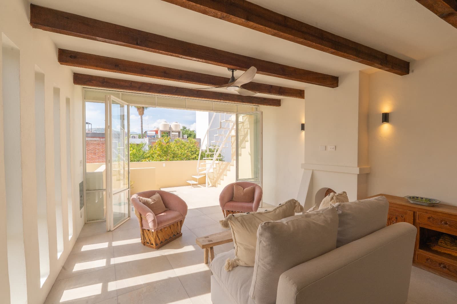 Condo del Sol — Guadalupe, San Miguel de Allende — photo 7 — luminous living with soaring beamed ceilings