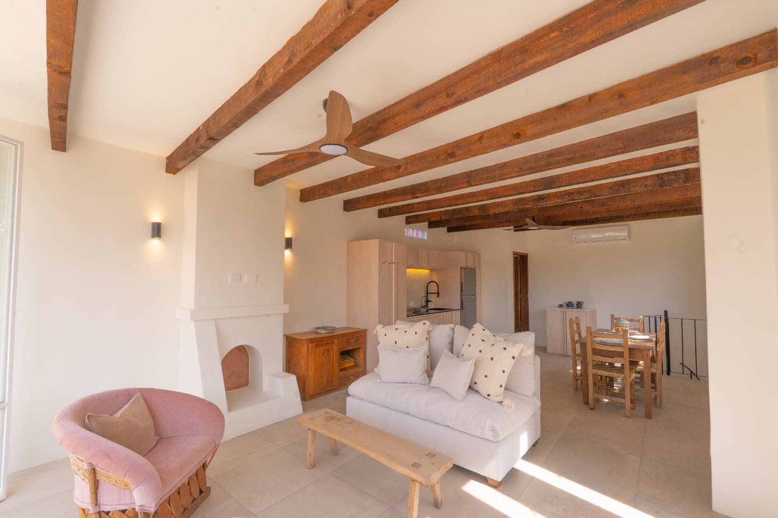 Condo del Sol — Guadalupe, San Miguel de Allende — photo 8 — rustic beams, luminous open living