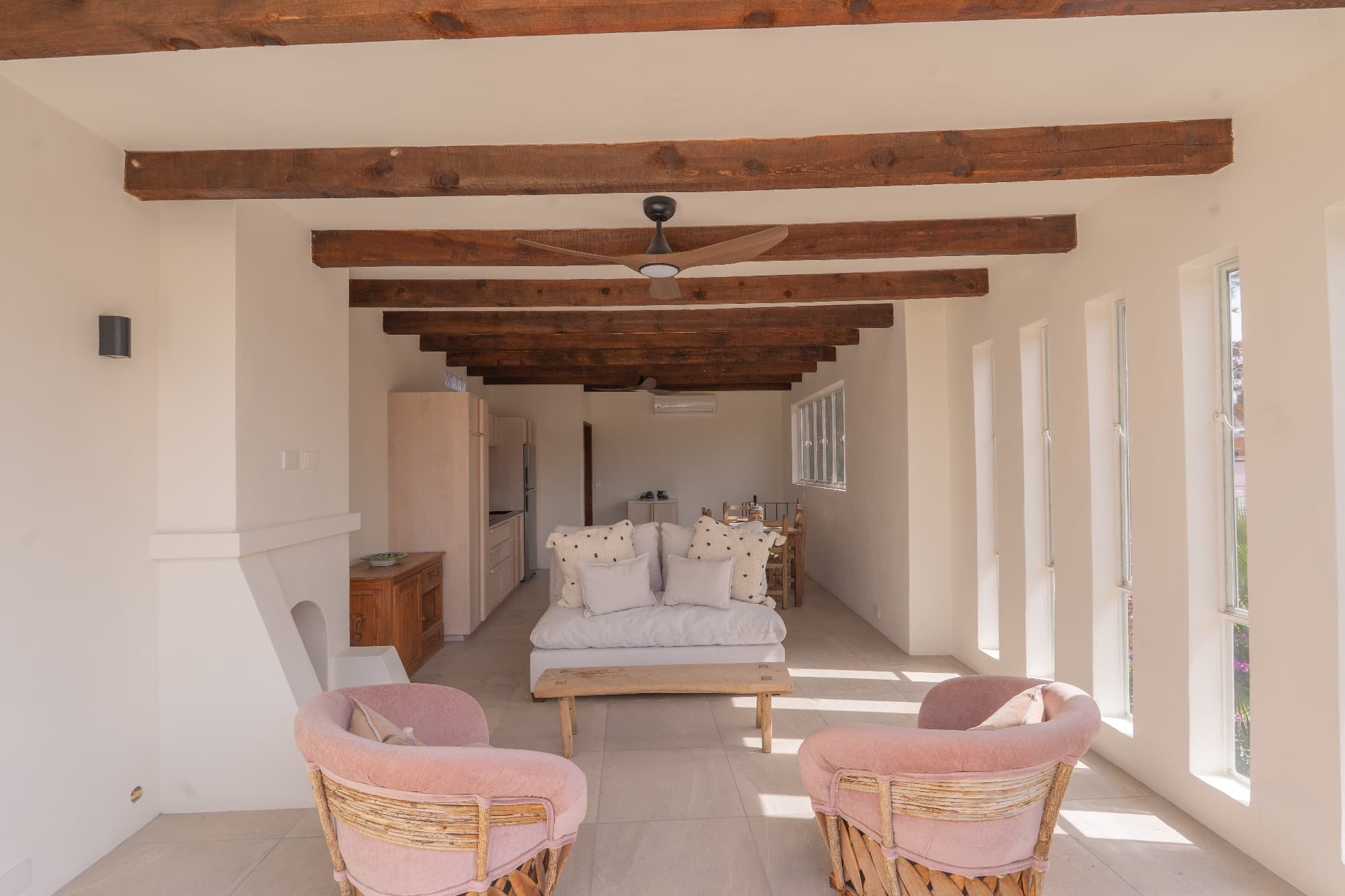 Condo del Sol — Guadalupe, San Miguel de Allende — photo 5 — sun-drenched master suite, rustic beams