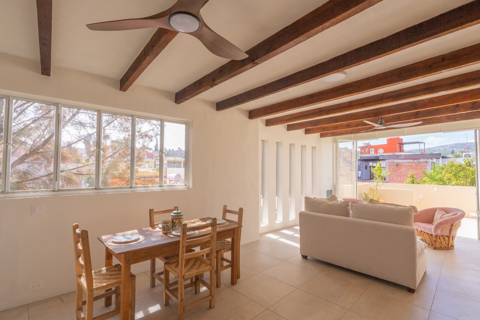 Condo del Sol — Guadalupe, San Miguel de Allende — photo 11 — luminous open-concept living with architectural beams