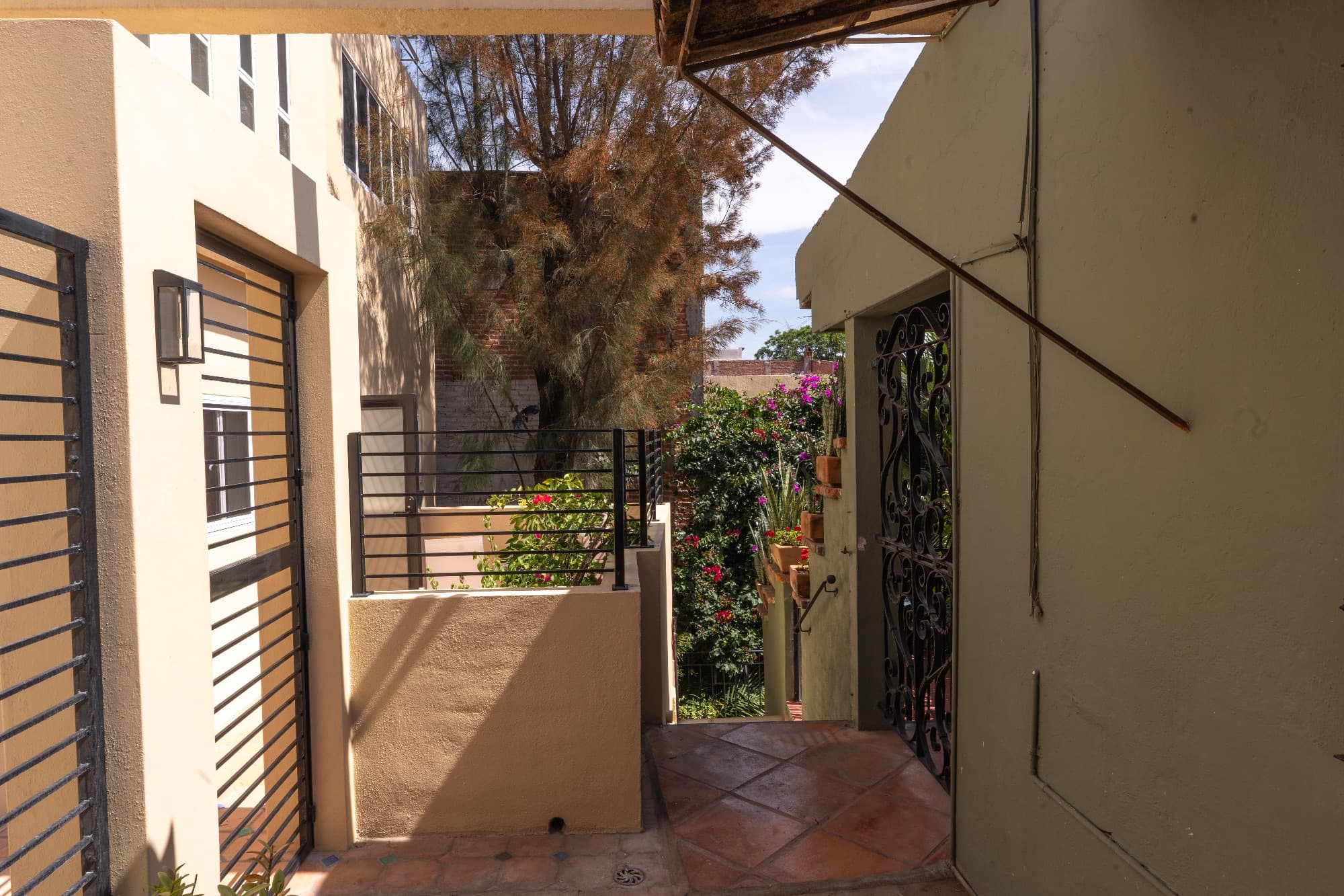 Condo del Sol — Guadalupe, San Miguel de Allende — photo 24 — sunlit courtyard with charming architectural details