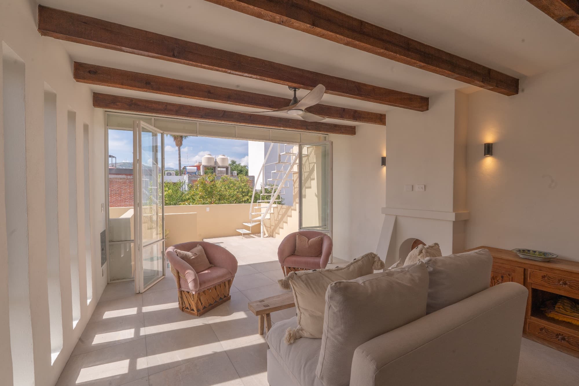 Condo del Sol — Guadalupe, San Miguel de Allende — photo 9 — sun-drenched living with terrace views