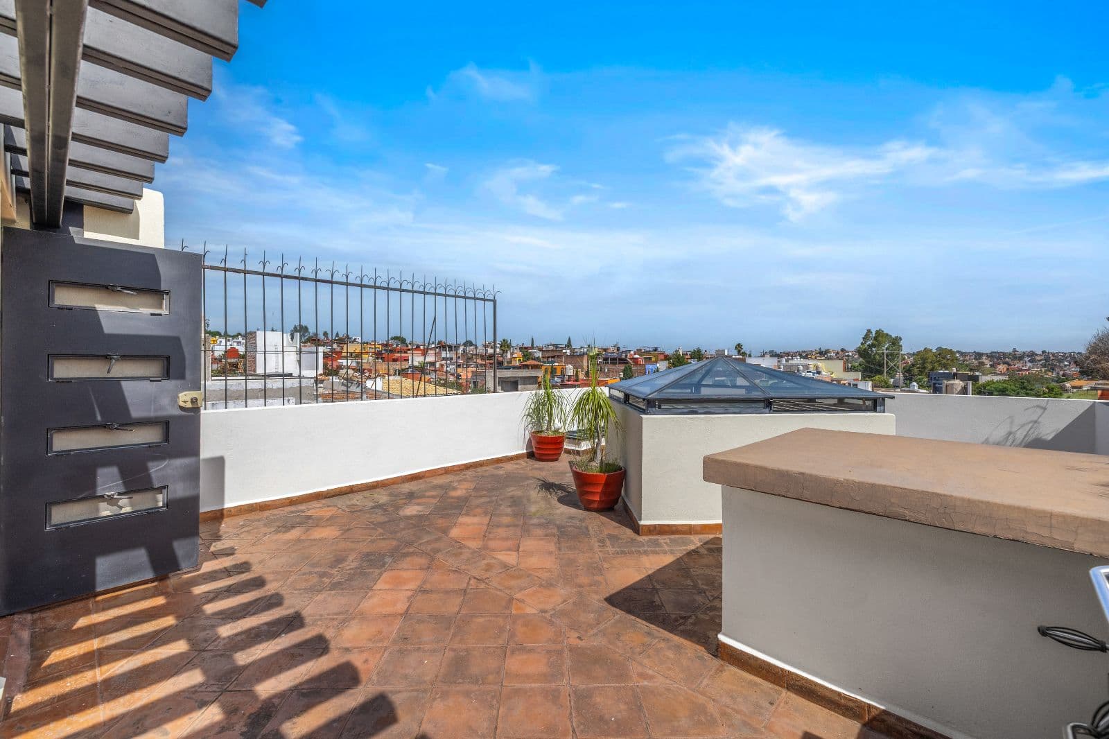 Casa Gorrion — Las Brisas, San Miguel de Allende — photo 11 — panoramic rooftop terrace with city views