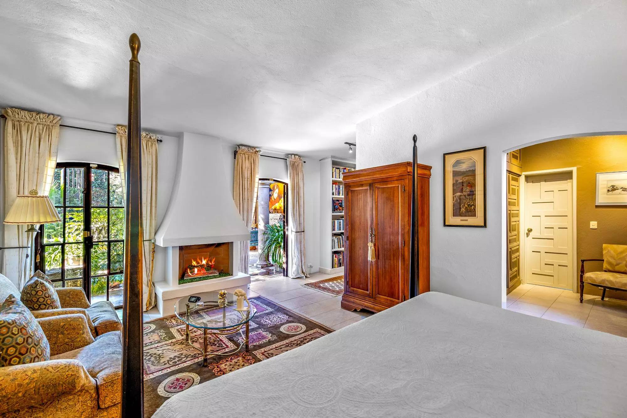 Casa Nispero — Atascadero (Arcos de San Miguel), San Miguel de Allende — photo 15 — luxurious master suite with fireplace views