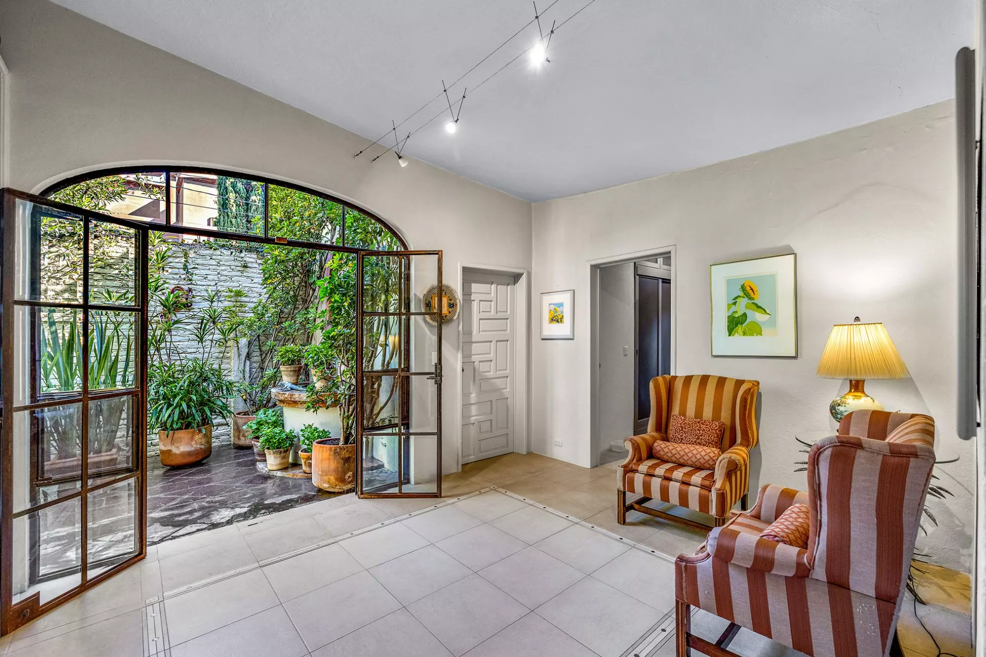 Casa Nispero — Atascadero (Arcos de San Miguel), San Miguel de Allende — photo 20 — elegant living room, garden courtyard views