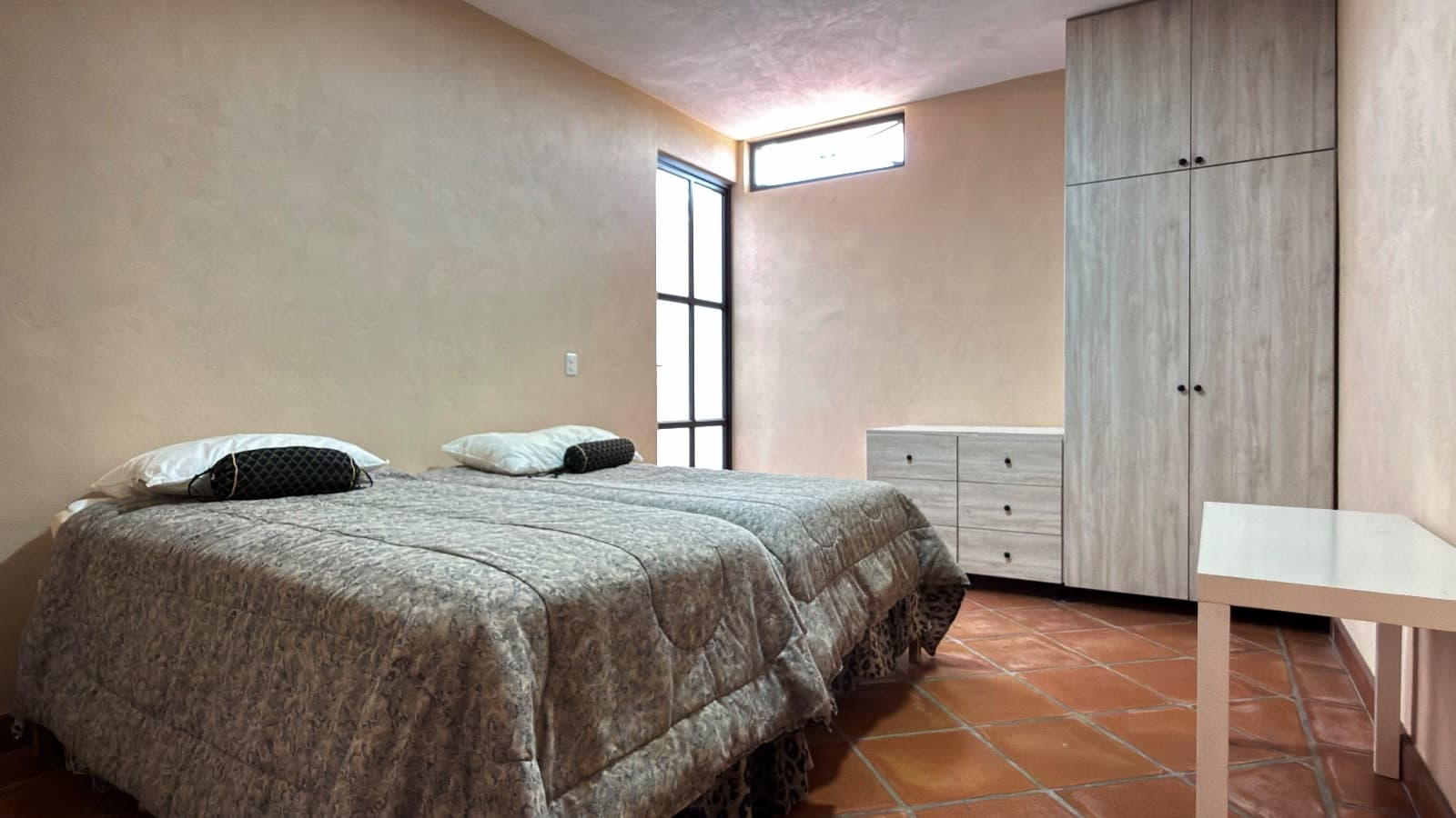 Duplex Juan Escutia 142 — Independencia, San Miguel de Allende — photo 10 — serene bedroom with abundant natural light