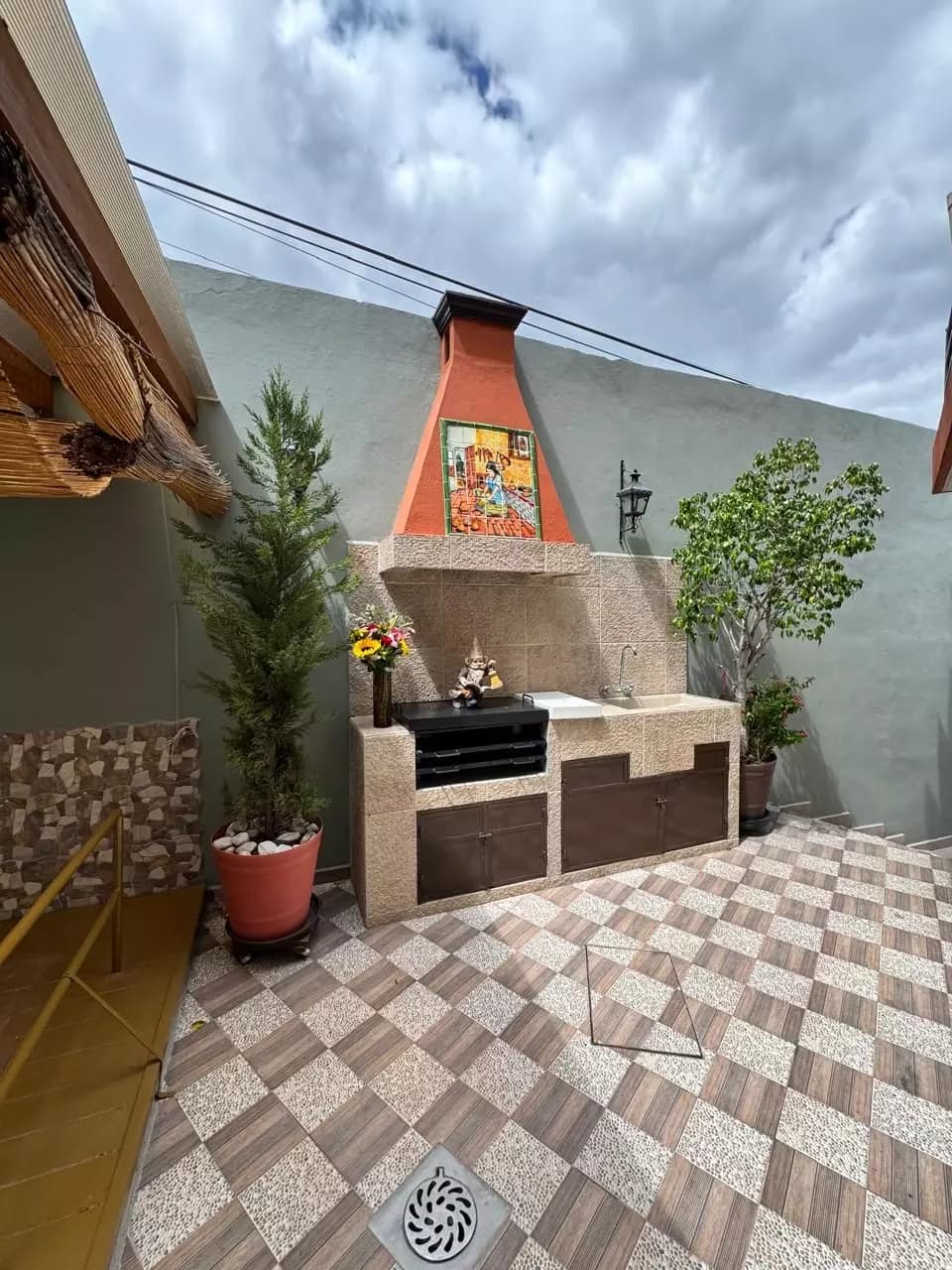 CASA LINDAVISTA — Lindavista, San Miguel de Allende — photo 2 — charming courtyard with traditional fireplace