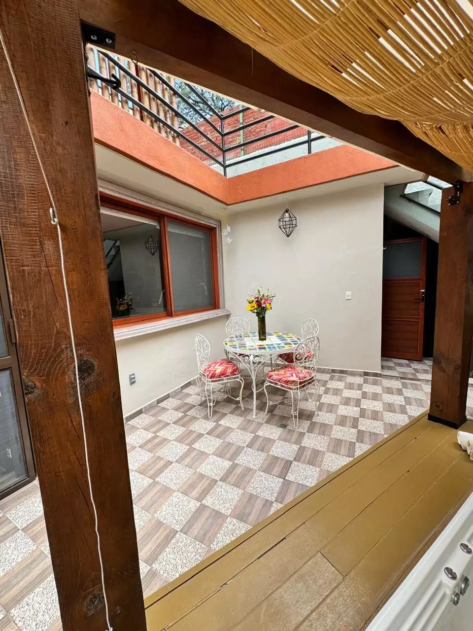 CASA LINDAVISTA — Lindavista, San Miguel de Allende — photo 5 — sun-drenched courtyard with architectural charm