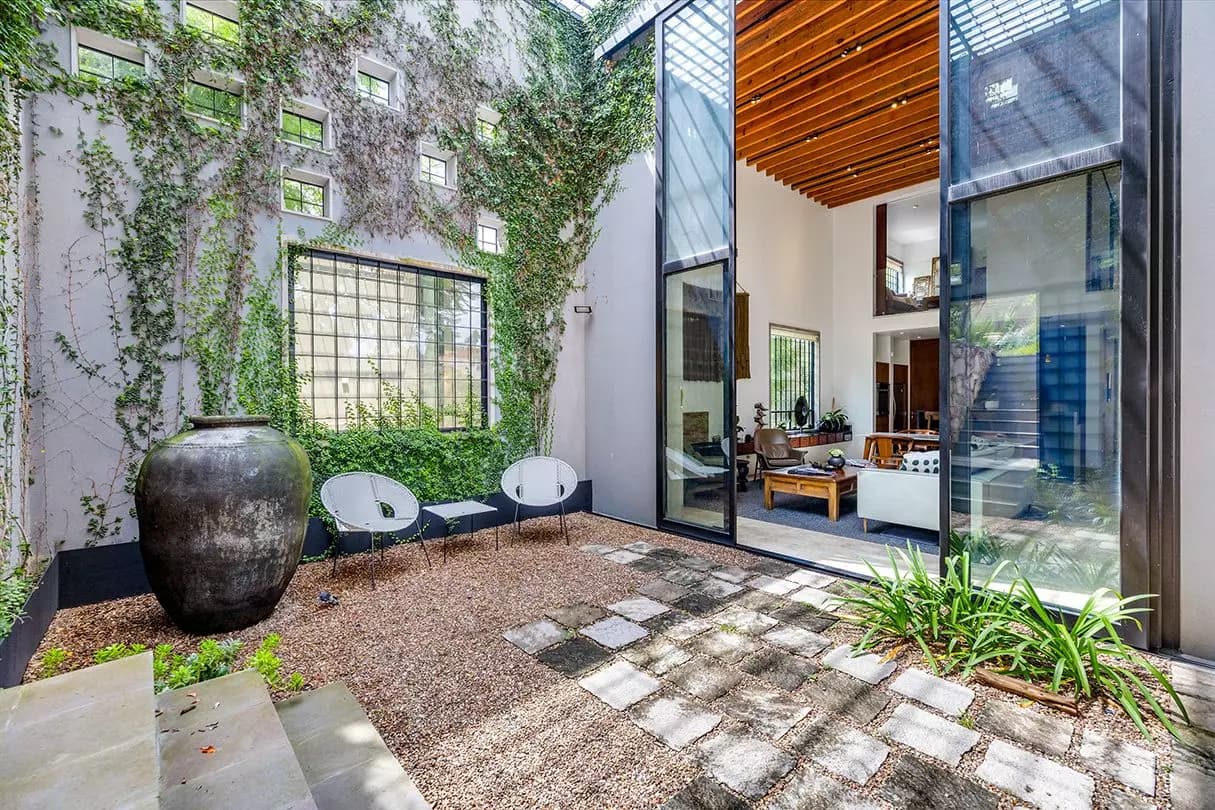 Casa Dos Gatos — Rinconada de Los Balcones, San Miguel de Allende — photo 6 — serene courtyard with verdant living walls