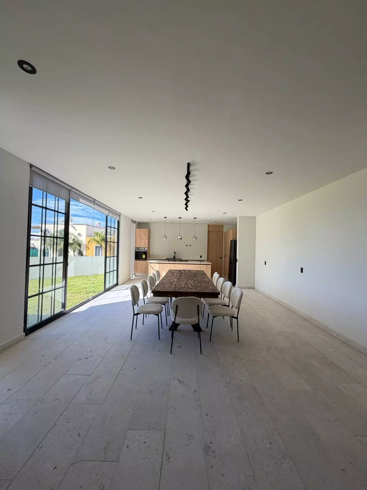 Casa La Losilla 54 — San Miguel de Allende Centro, San Miguel de Allende — photo 11 — sophisticated dining with seamless indoor-outdoor living