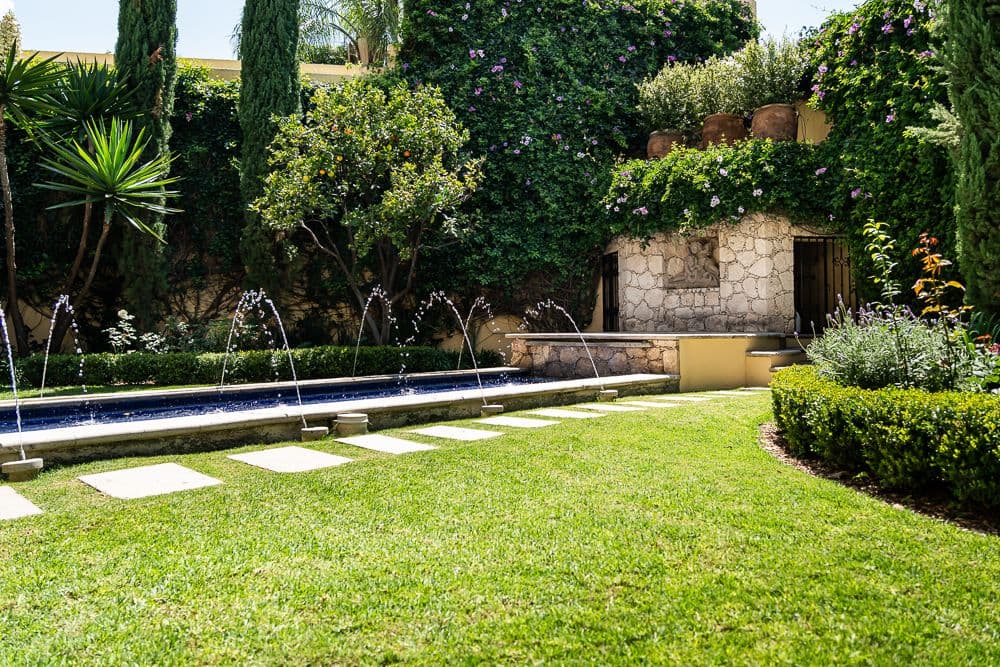 Casa Bella — Guadiana, San Miguel de Allende — photo 16 — serene garden oasis with fountain features