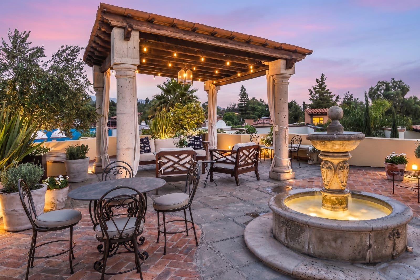 Casa Bella — Guadiana, San Miguel de Allende — photo 23 — enchanting twilight rooftop entertaining space