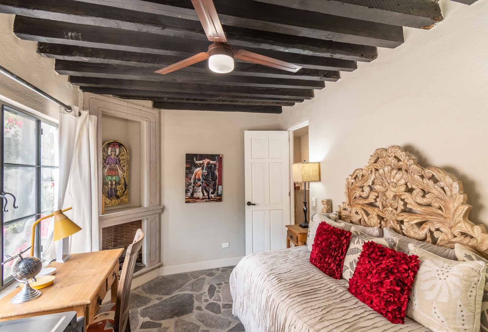 The Hidden Enclave — Centro, San Miguel de Allende — photo 14 — rustic-chic bedroom with soaring beams
