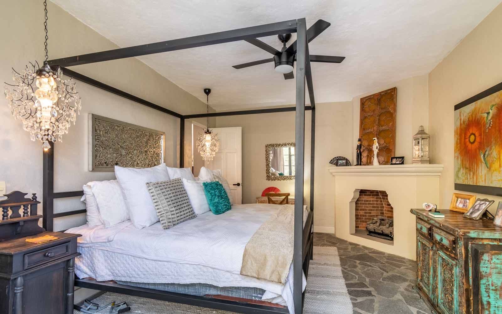 The Hidden Enclave — Centro, San Miguel de Allende — photo 16 — elegant master suite with architectural charm