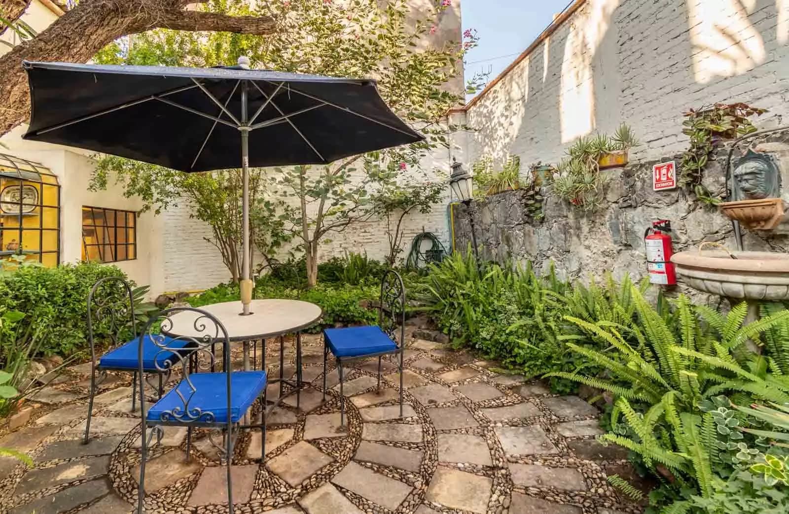 Villa Mariposa — Atascadero (Arcos de San Miguel), San Miguel de Allende — photo 7 — charming courtyard oasis, dappled shade