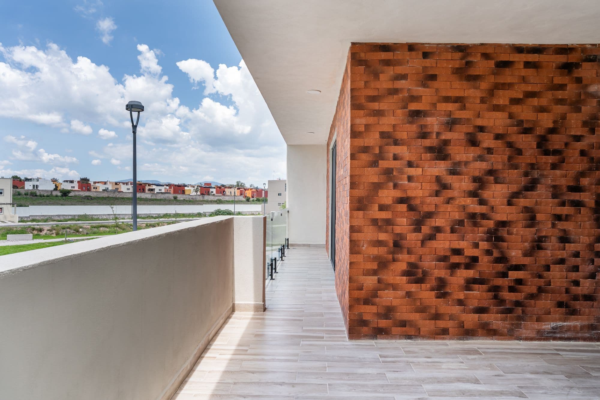Casa Lavanda — Zirándaro, San Miguel de Allende — photo 26 — sunlit terrace, architectural brick elegance