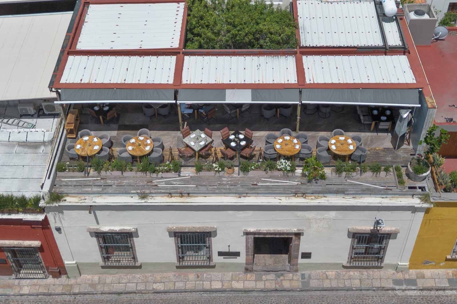 Sollano 18 — Centro, San Miguel de Allende — photo 18 — elevated rooftop dining oasis beckons