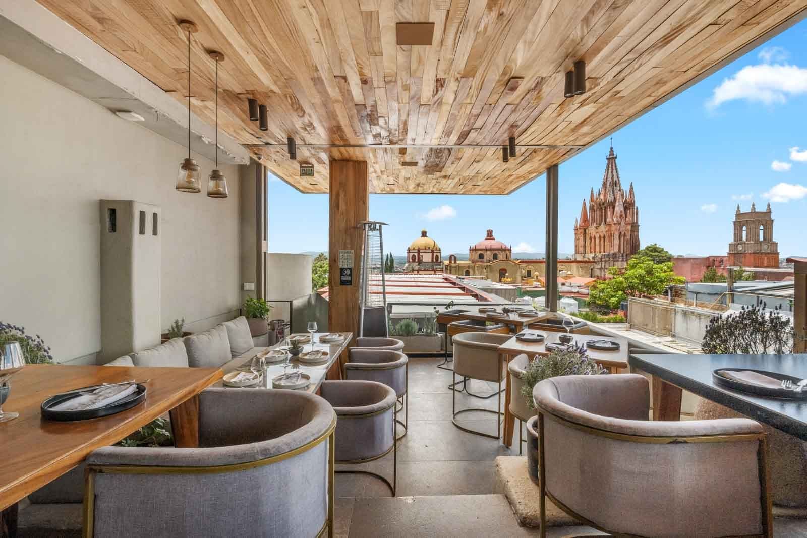 Sollano 18 — Centro, San Miguel de Allende — photo 15 — panoramic rooftop dining with architectural splendor