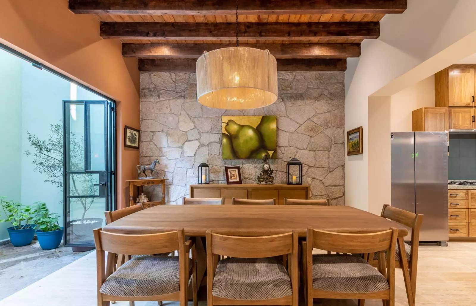 Villa Kusama — Guadiana, San Miguel de Allende — photo 7 — sophisticated dining with soaring wooden beams