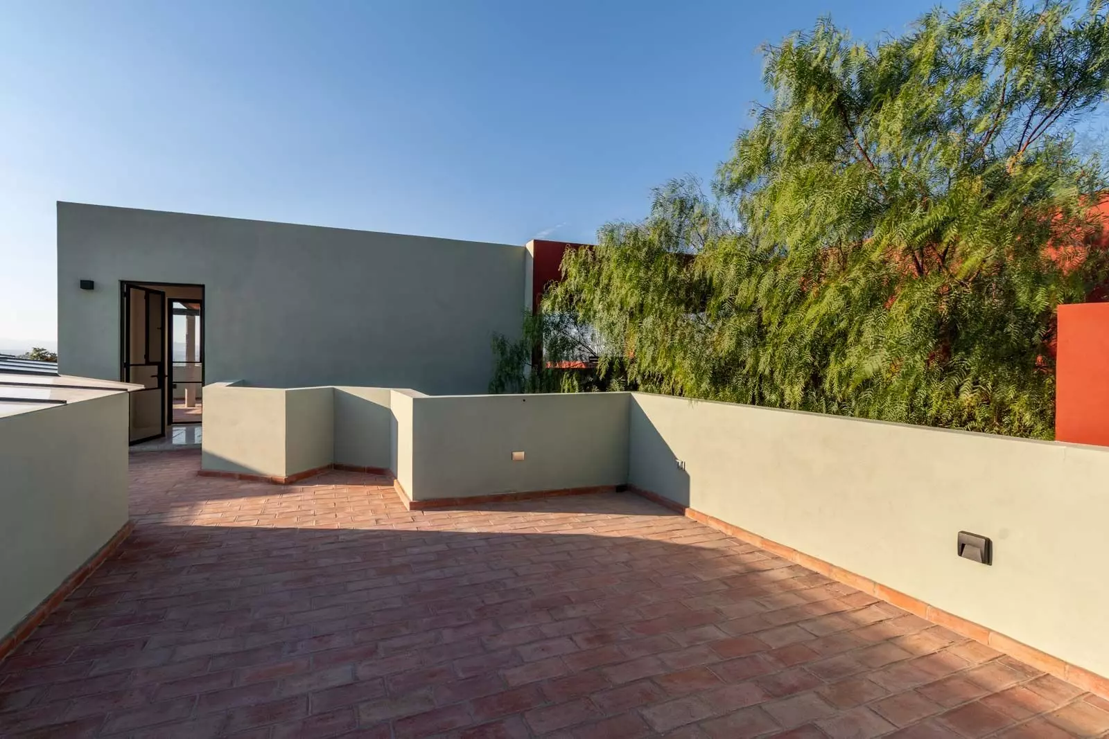 Villa Kusama — Guadiana, San Miguel de Allende — photo 8 — expansive rooftop terrace, architectural detail