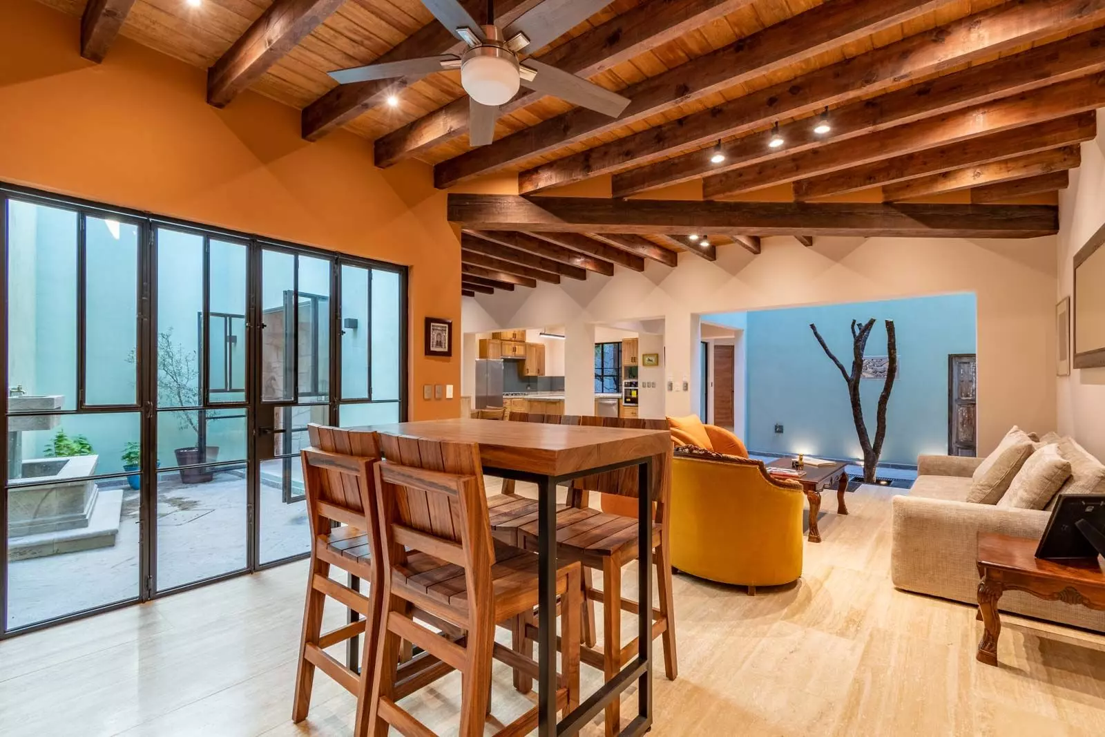 Villa Kusama — Guadiana, San Miguel de Allende — photo 9 — soaring beams, vibrant warmth, seamless indoor-outdoor living