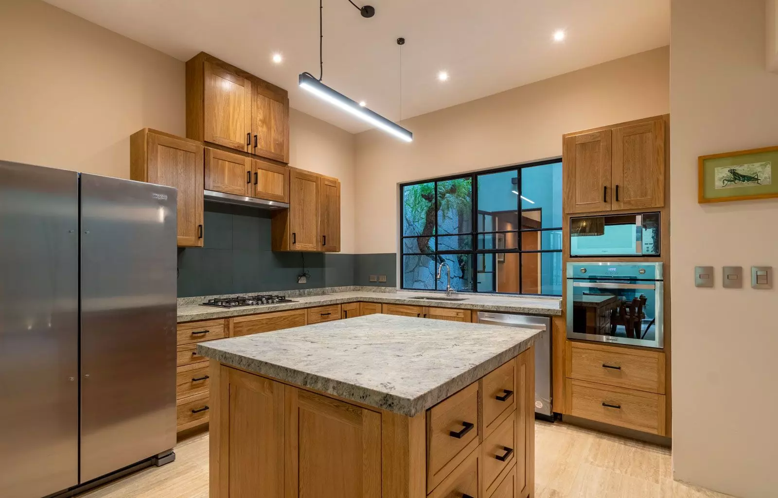 Villa Kusama — Guadiana, San Miguel de Allende — photo 17 — contemporary gourmet kitchen with abundant natural light