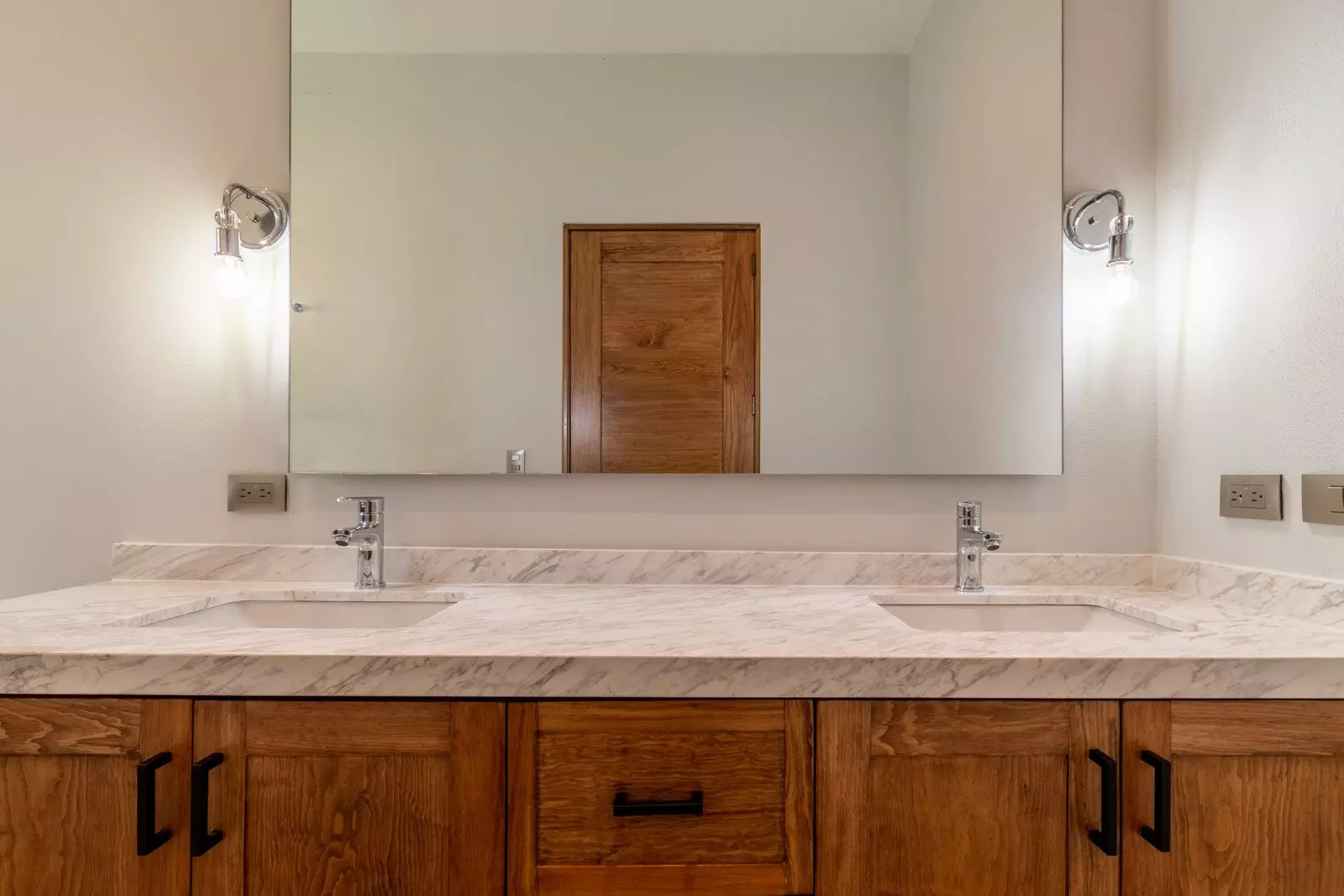 Villa Kusama — Guadiana, San Miguel de Allende — photo 20 — elegant dual vanity, marble luxury