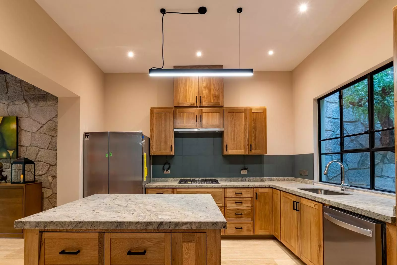 Villa Kusama — Guadiana, San Miguel de Allende — photo 24 — contemporary luxury kitchen with abundant natural light