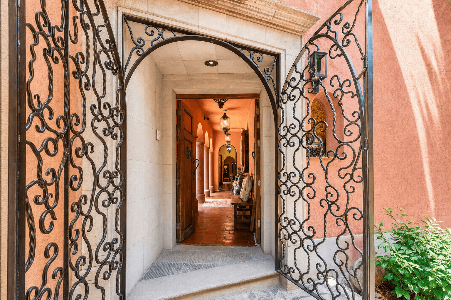 Casa Gibson — Centro, San Miguel de Allende — photo 20 — ornate ironwork frames elegant passageway