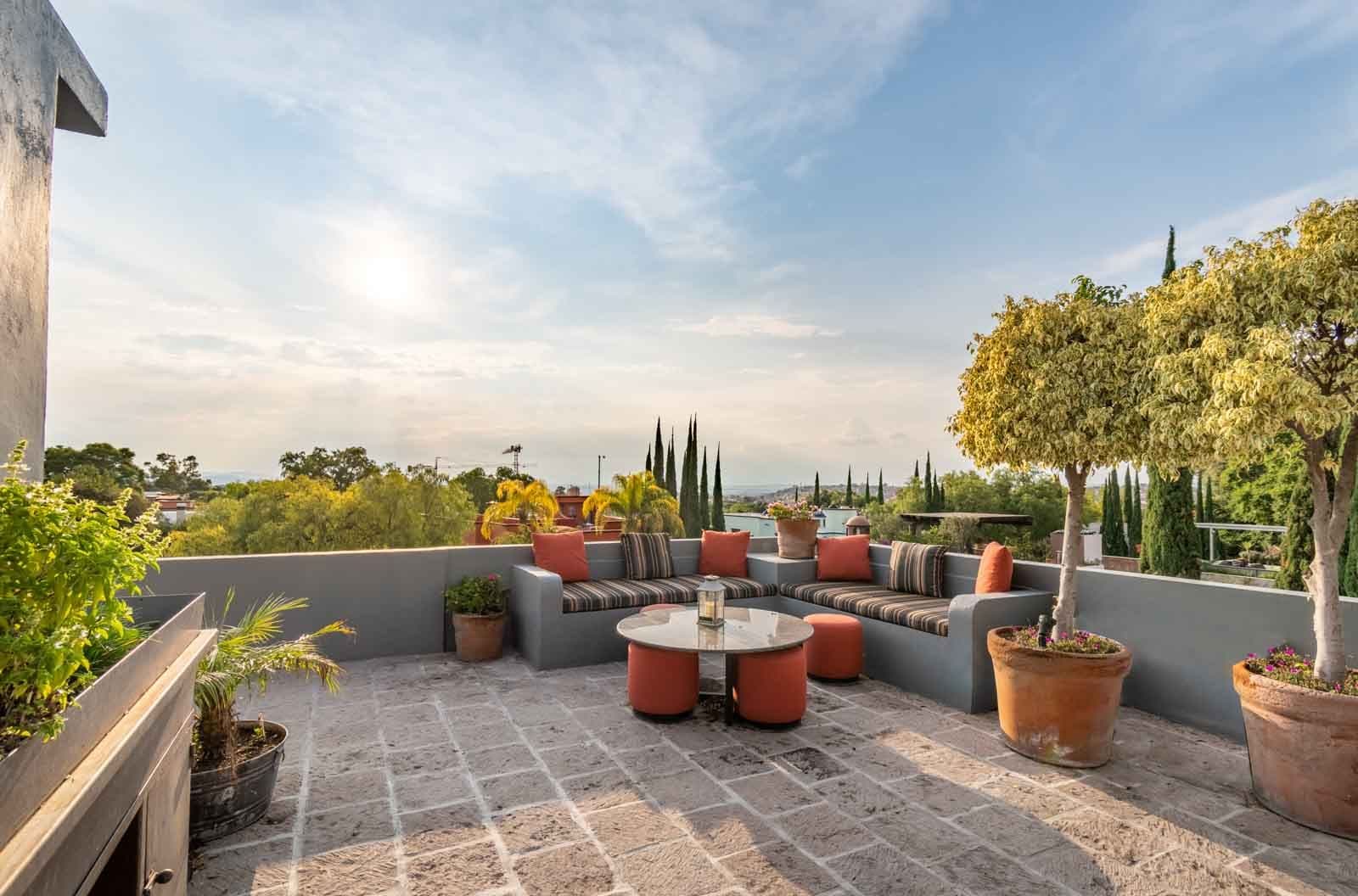 Villa Pirúl — Centro, San Miguel de Allende — photo 24 — panoramic rooftop terrace, sophisticated entertaining space
