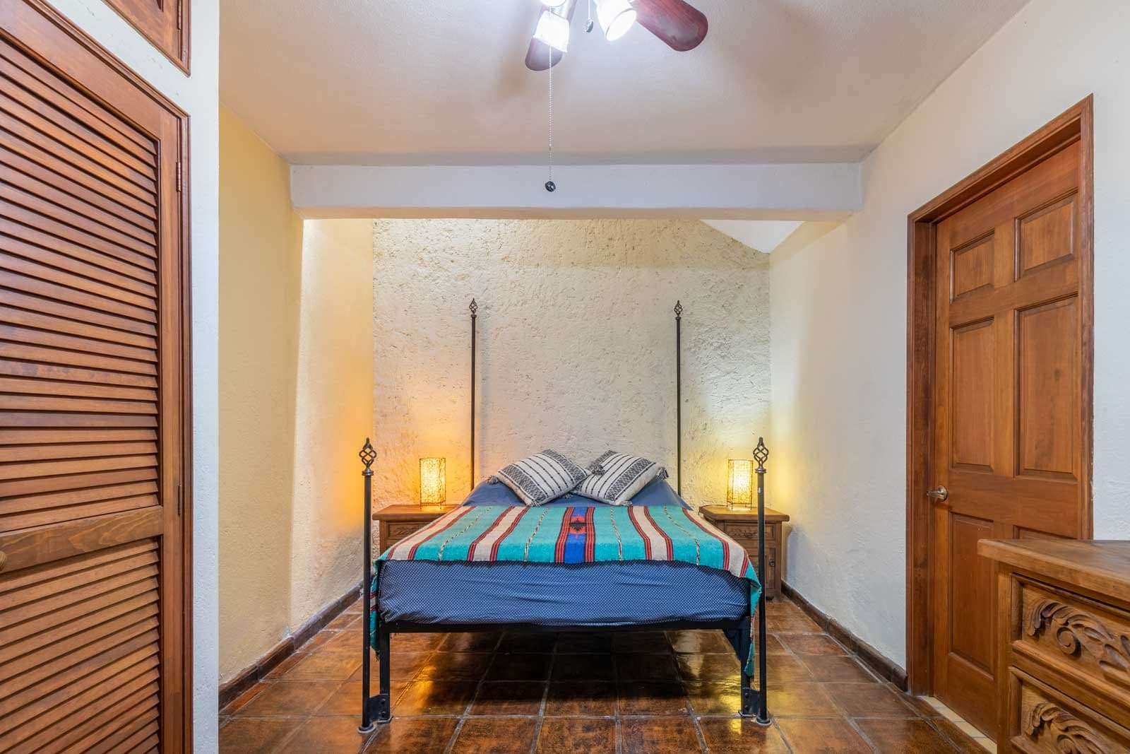 Casa las Nubes — San Antonio, San Miguel de Allende — photo 23 — rustic bedroom with ambient lighting