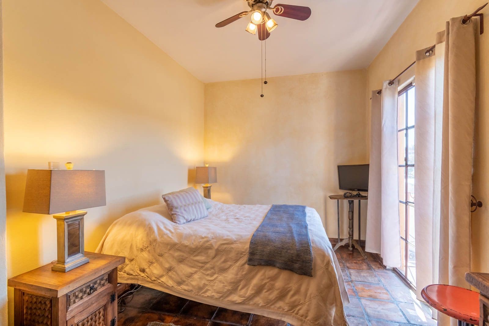 Casa las Nubes — San Antonio, San Miguel de Allende — photo 7 — sunlit bedroom, warm authentic charm