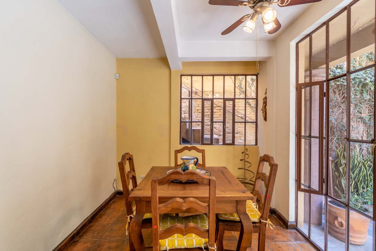 Casa las Nubes — San Antonio, San Miguel de Allende — photo 21 — charming colonial dining with garden views