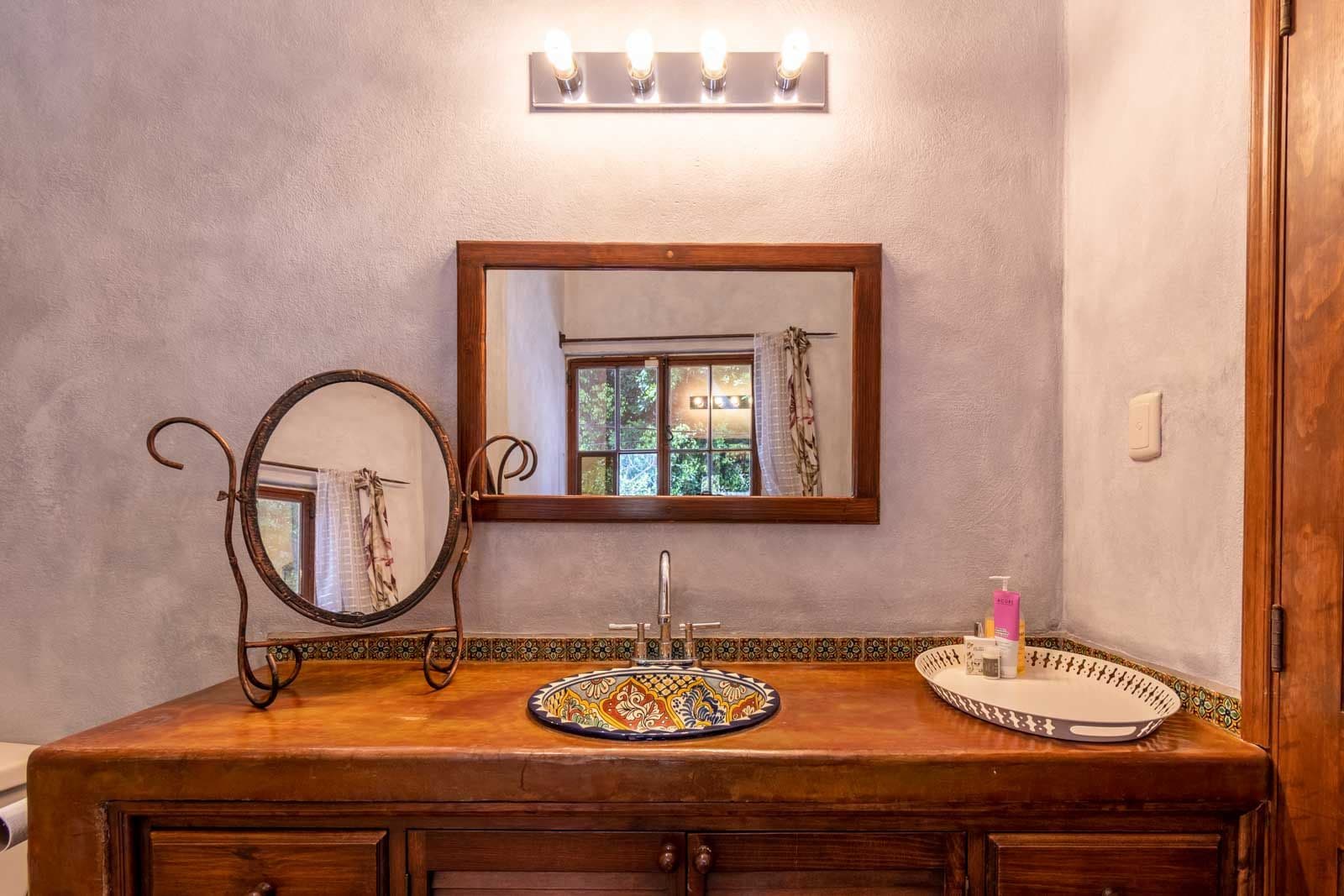 Casa las Nubes — San Antonio, San Miguel de Allende — photo 11 — artisan bathroom with authentic mexican charm