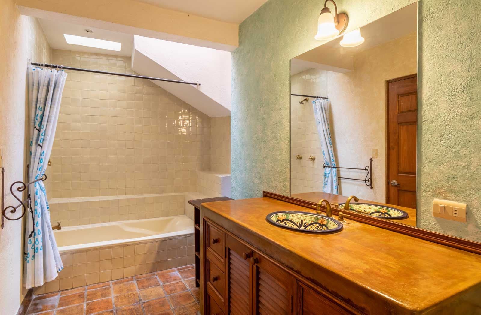 Casa las Nubes — San Antonio, San Miguel de Allende — photo 25 — luminous spa-like master bath sanctuary