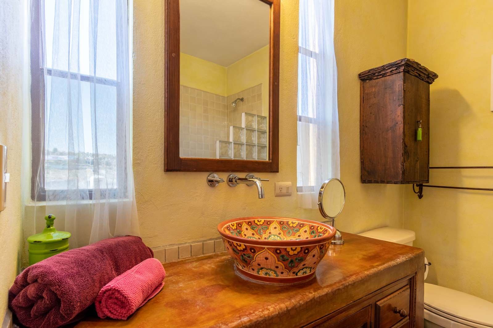 Casa las Nubes — San Antonio, San Miguel de Allende — photo 9 — vibrant artisan bathroom with natural light