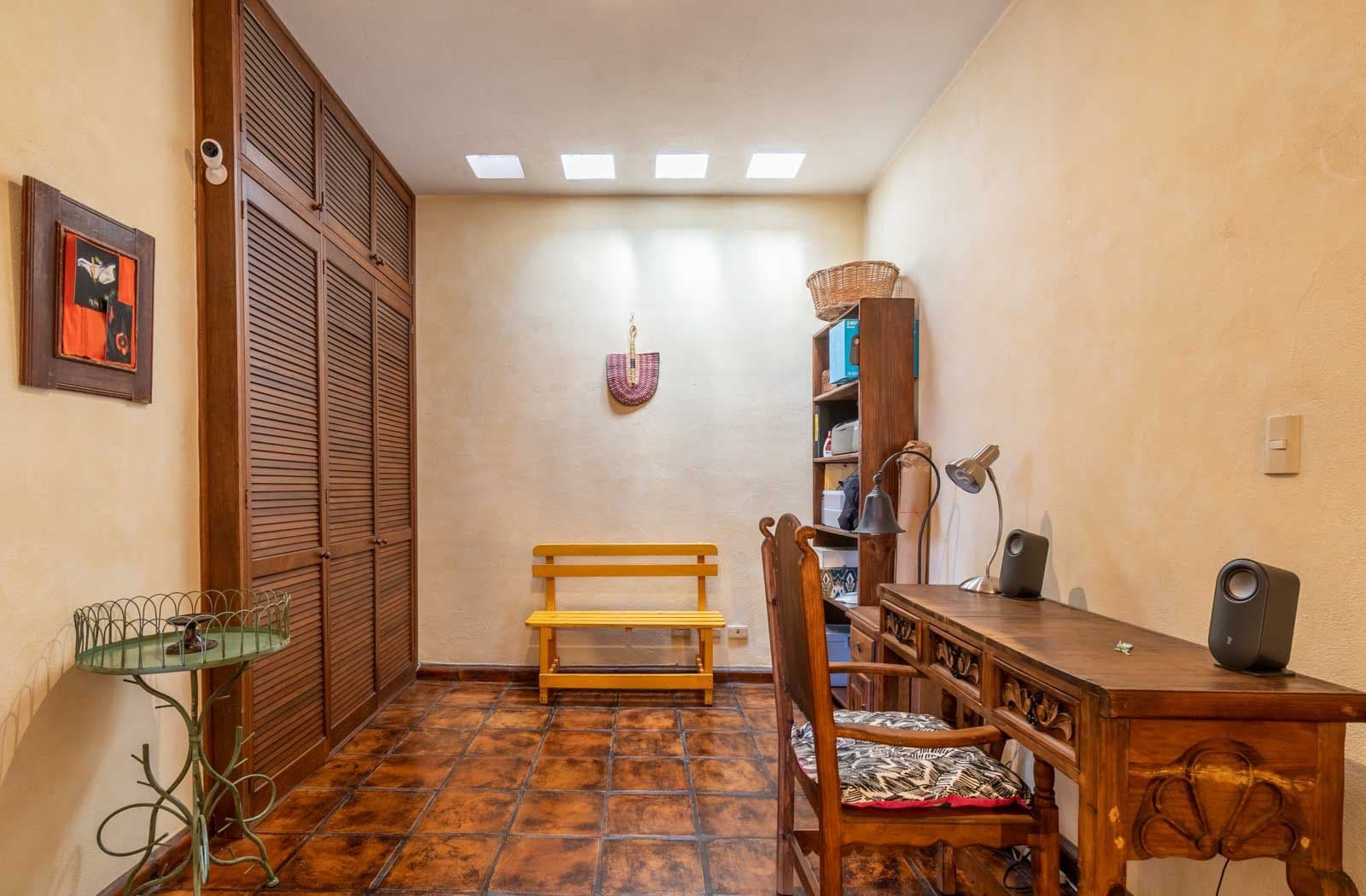 Casa las Nubes — San Antonio, San Miguel de Allende — photo 12 — charming home office, warm terracotta elegance