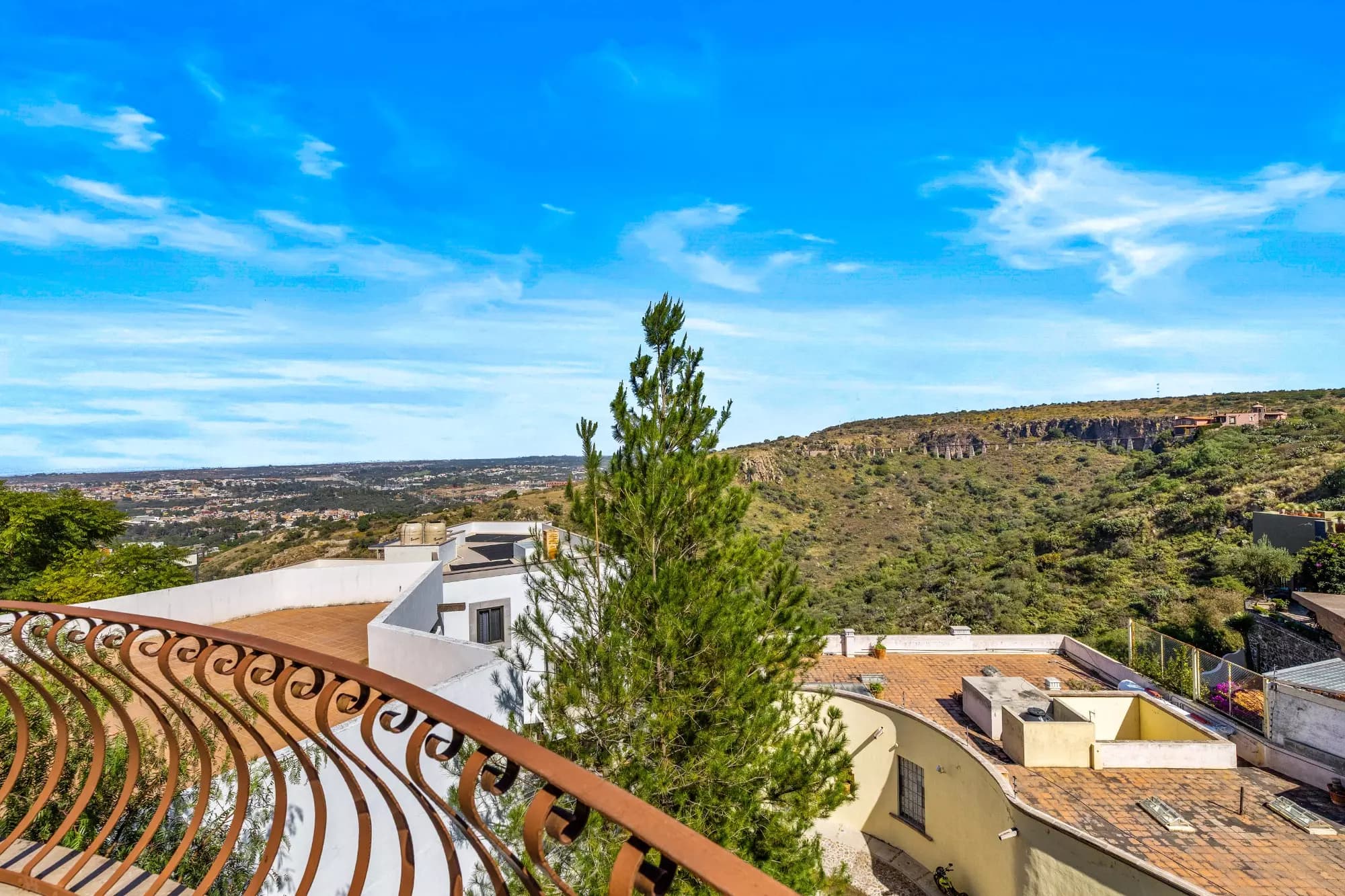 Casa Stone — Balcones, San Miguel de Allende — photo 9 — panoramic hillside views, architectural elegance
