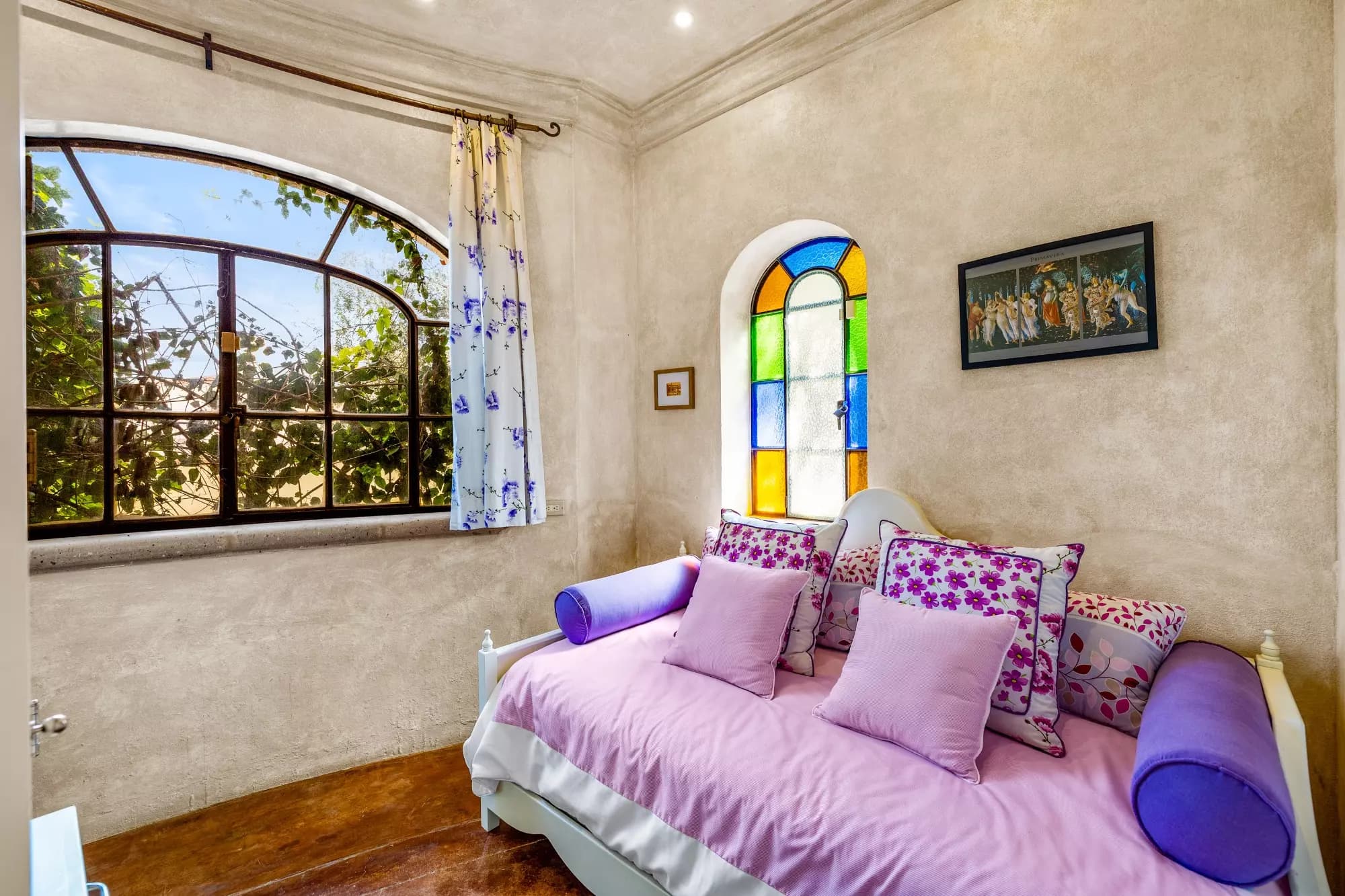 Casa Stone — Balcones, San Miguel de Allende — photo 10 — charming bedroom with stained glass elegance