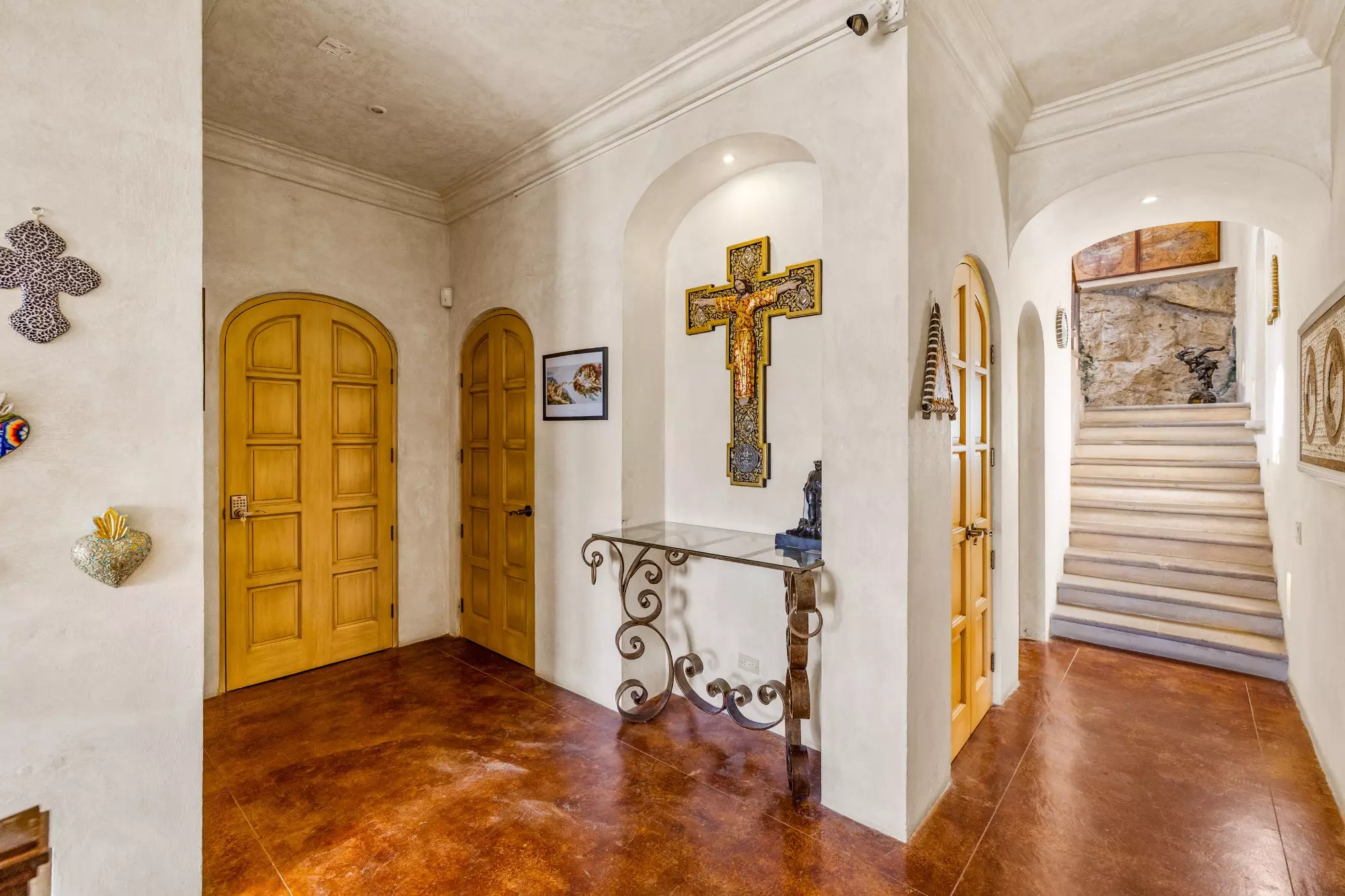 Casa Stone — Balcones, San Miguel de Allende — photo 13 — elegant foyer with ornate architectural charm