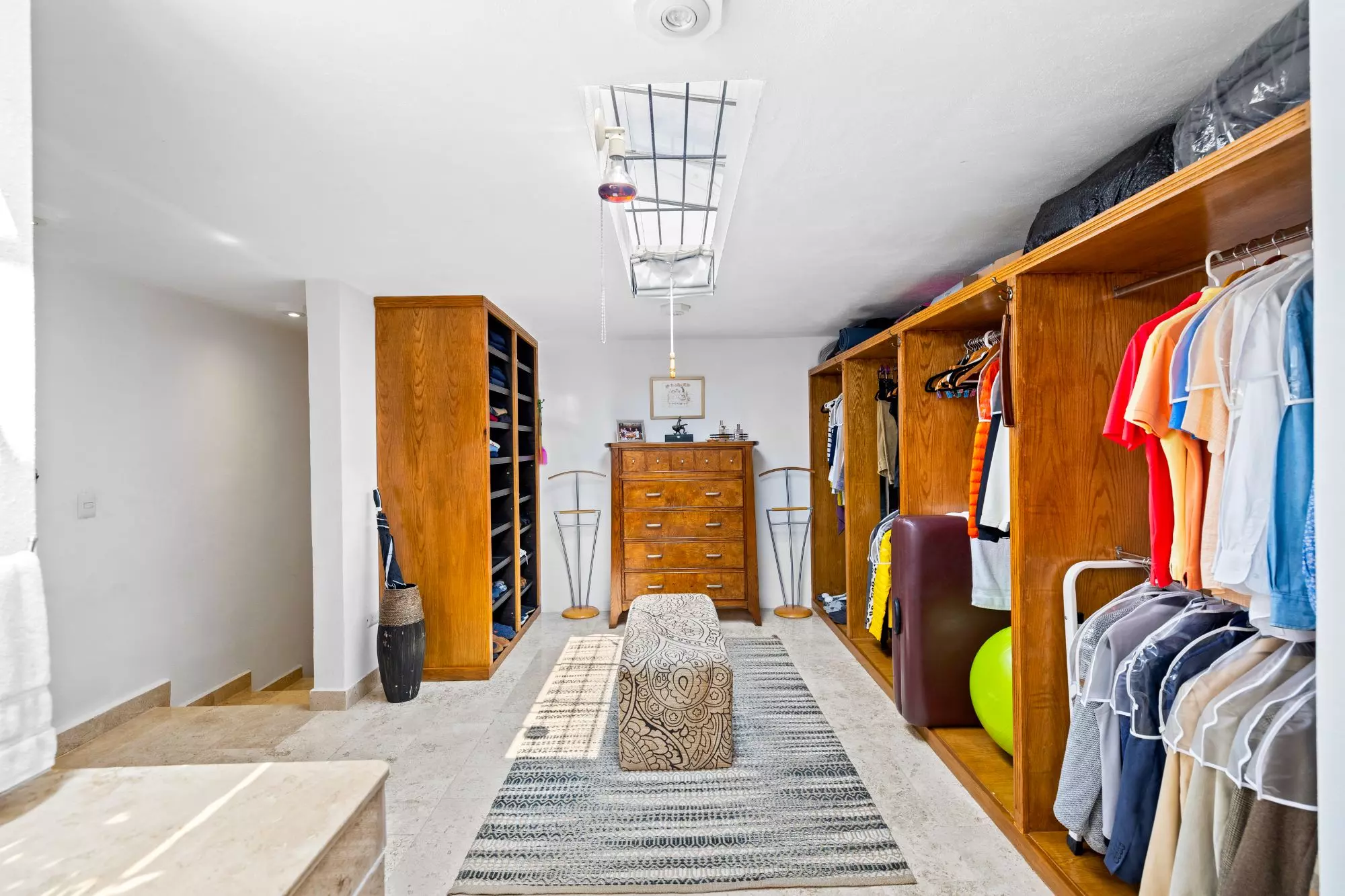Casa del Foro — Balcones, San Miguel de Allende — photo 3 — luxurious walk-in closet, abundant natural light