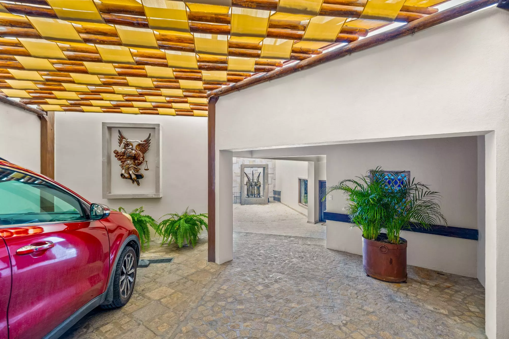 Casa del Foro — Balcones, San Miguel de Allende — photo 5 — elegant covered carport with architectural charm