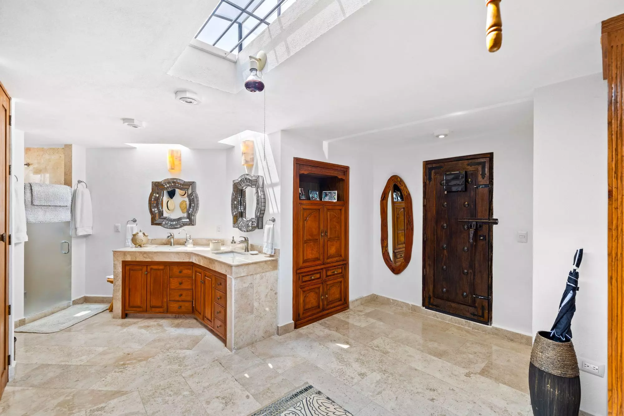 Casa del Foro — Balcones, San Miguel de Allende — photo 19 — spa-like master bath, skylit elegance