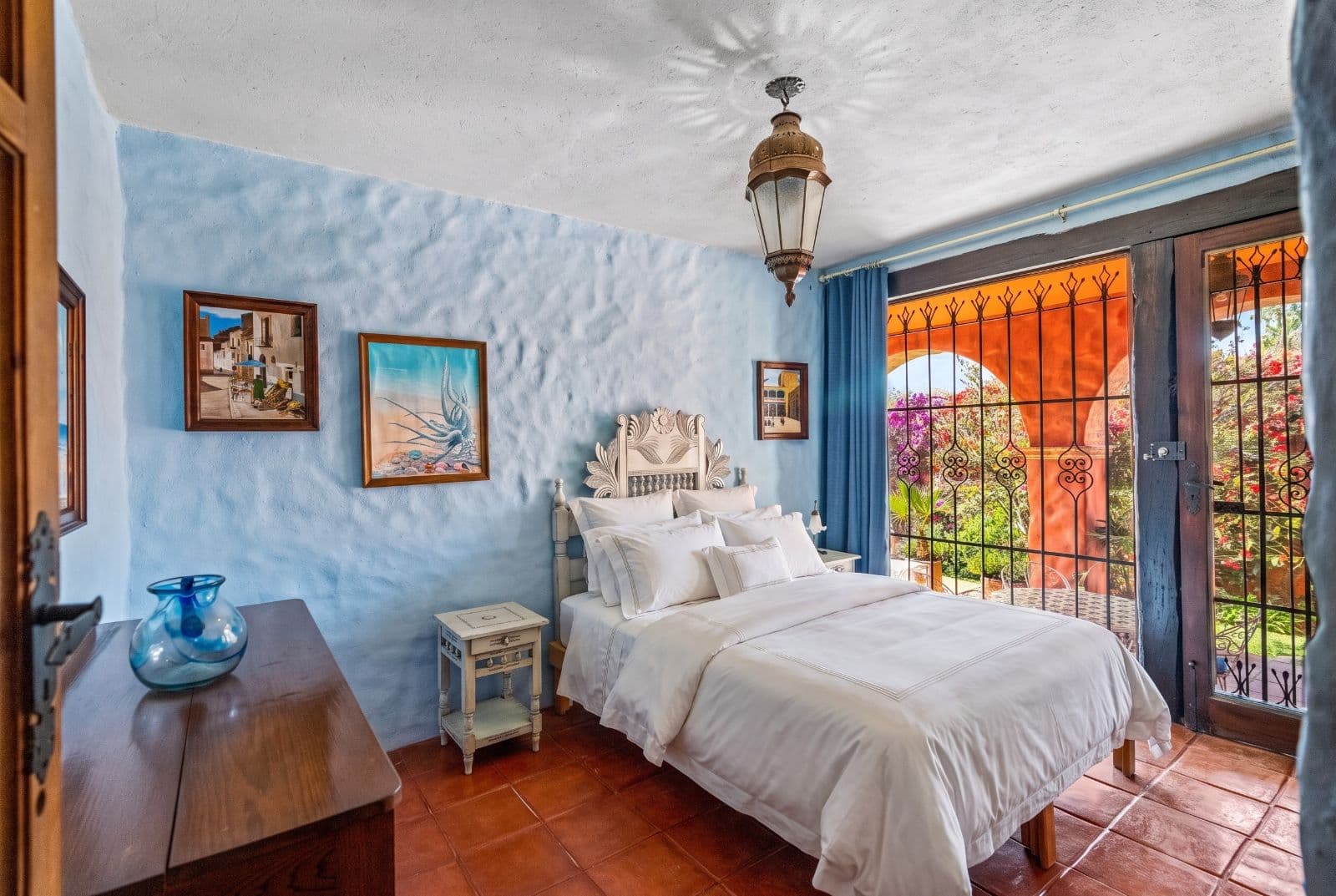 Casa Savia | A Private Garden Sanctuary in Los Frailes — Villa de los Frailes, San Miguel de Allende — photo 15 — serene colonial bedroom with garden views